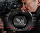 Hunter using thermal rifle scope with 1.03-inch AMOLED display and 60mm eye relief for night predator hunting