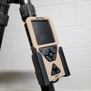 PVO Thermal LB3X laser rangefinder mounted on rifle, featuring digital display and control buttons for predator hunting gear.