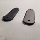 Black and gray thermal scope battery covers for predator hunting gear